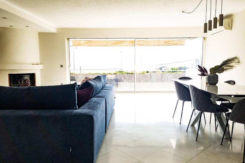 1, Kotzia Str. & Poseidonos Avenue, Alimos