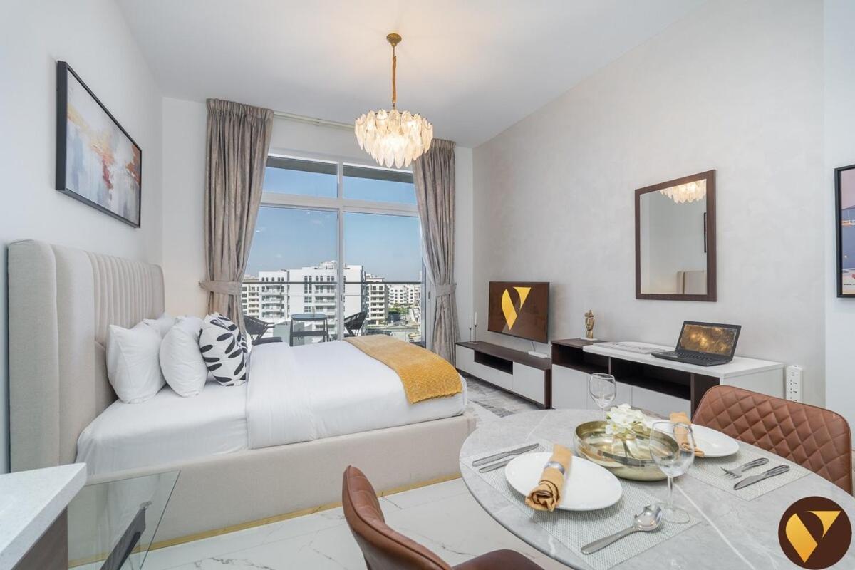 Vogue Vacation Homes, Arjan Jwelz by Danube Near Miracle And Butterfly Garden, Studio Apartment with Balcony And Vibrant Community View, Access To All Amenities