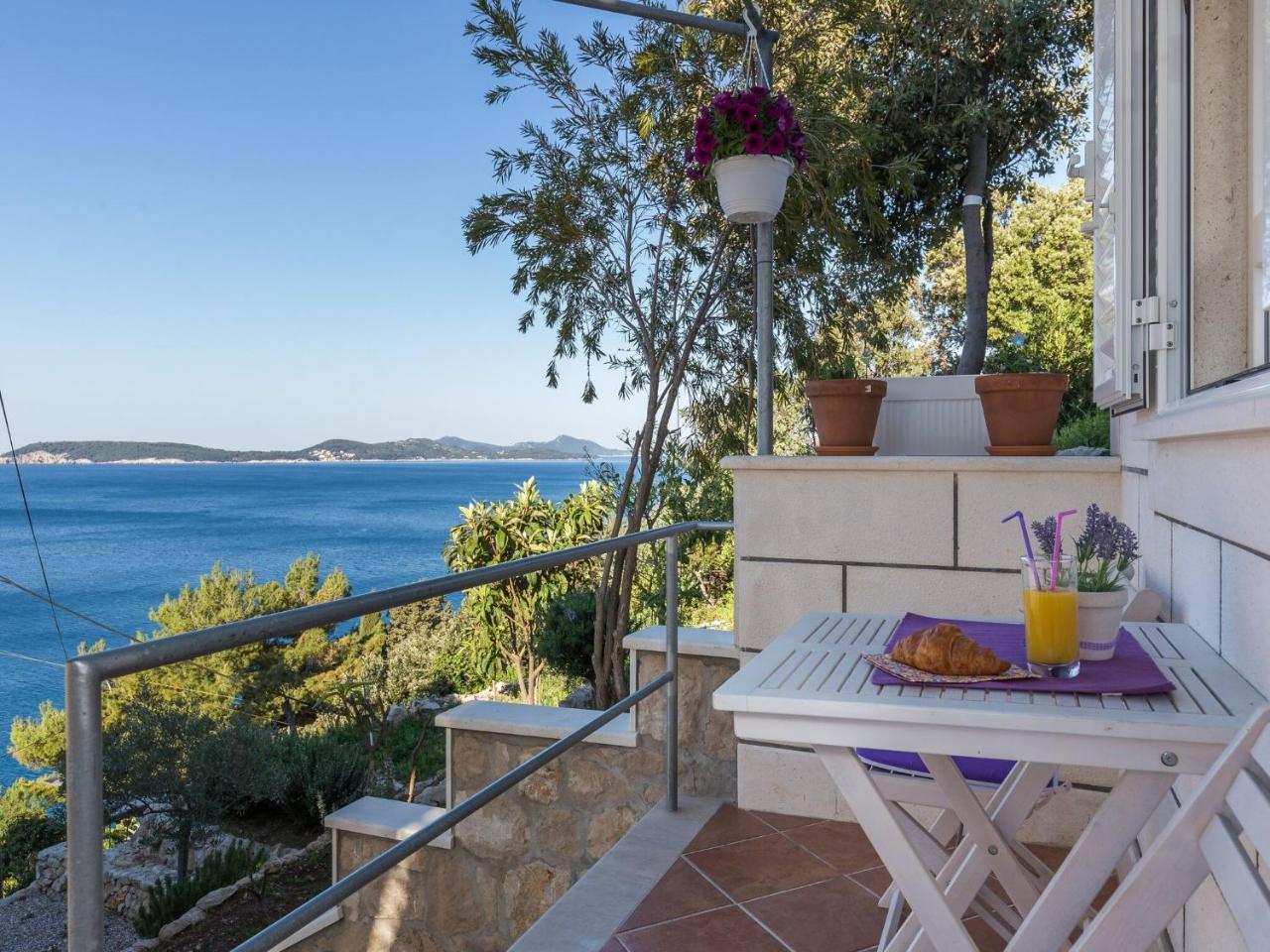 Apartments Lovro Duplex One Bedroom Apartment With Terrace & Partial Sea View 1
