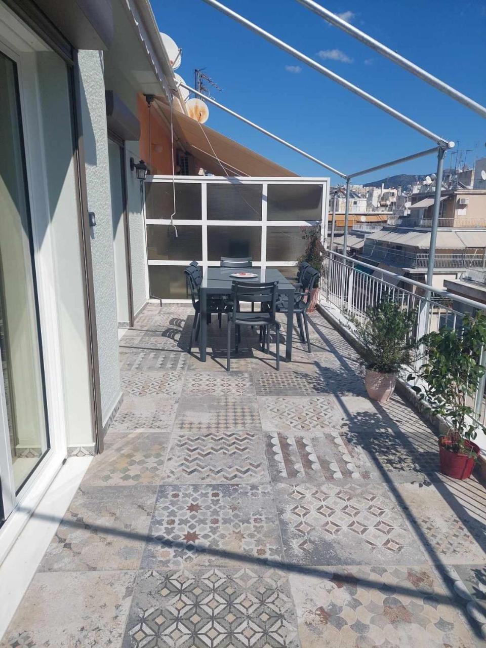 The Sunny Terrace Of Athens