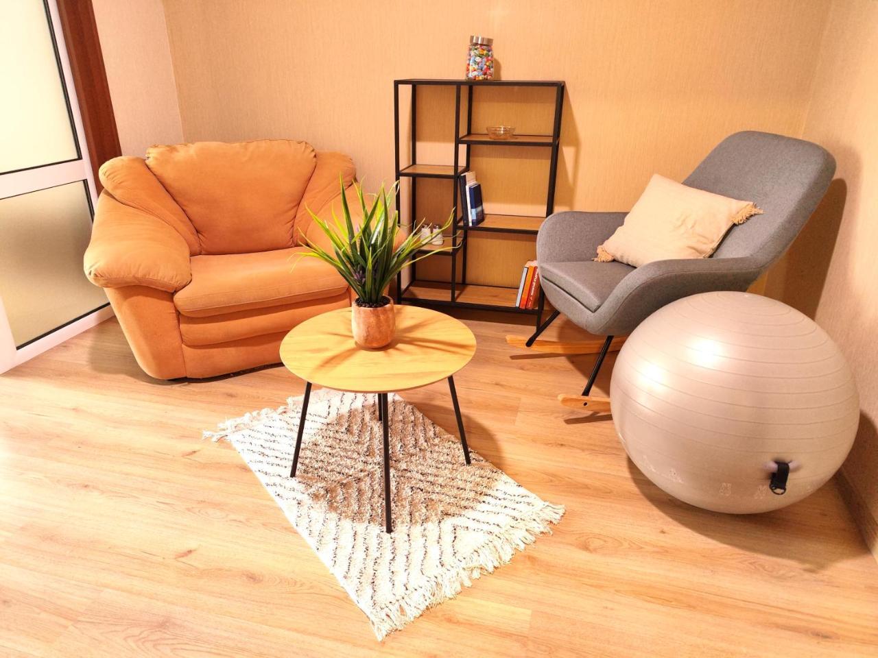 Orange Couch Apartment