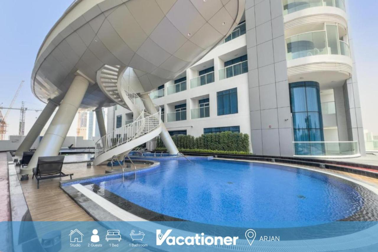 Vacationer Holiday Homes I Premium Studio I Pool & Gym Access I Near Miracle Garden I Opalz Tower 2